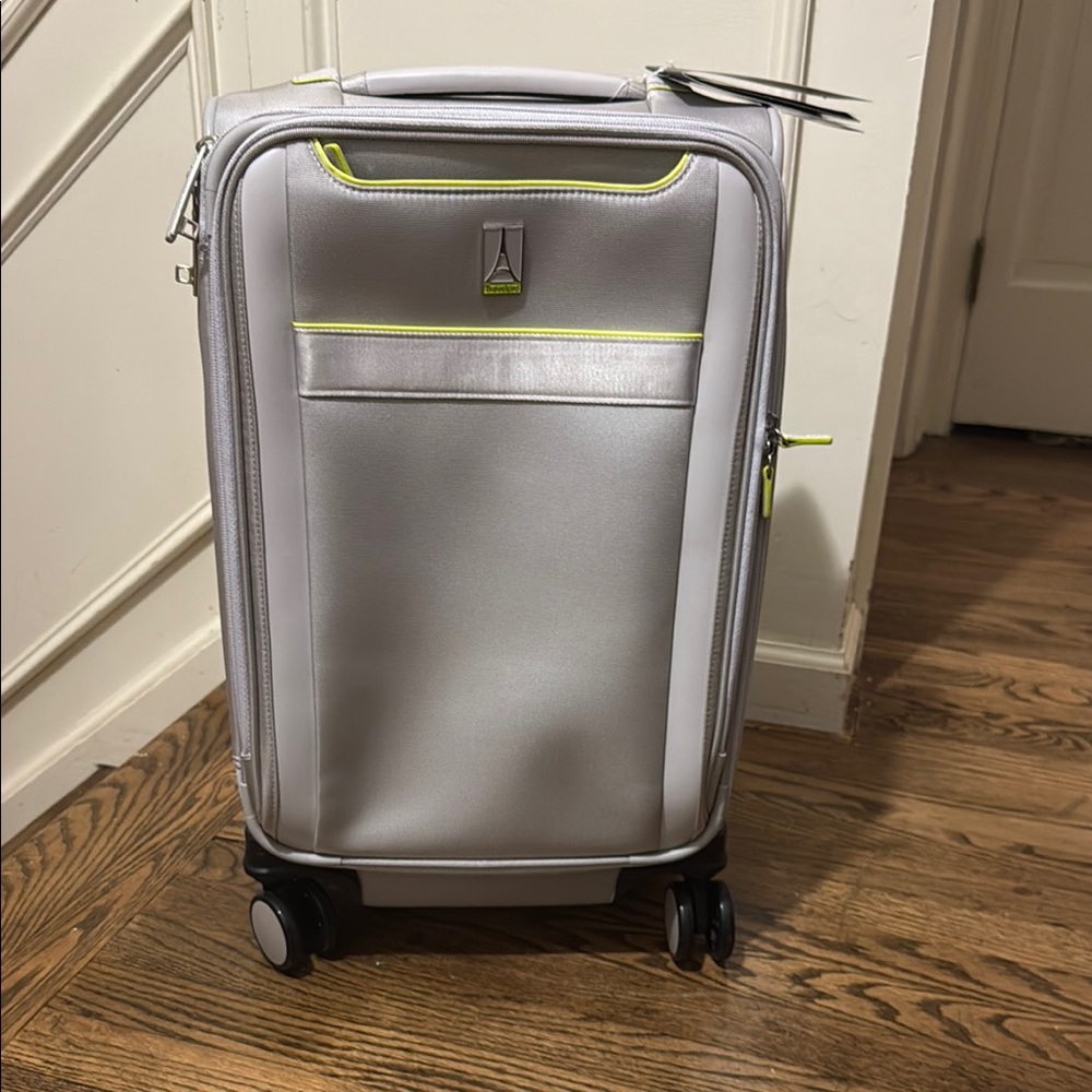 TravelPro Silver Carry-On Spinner Suitcase - new with tags